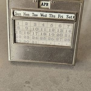 J. E. Mergott Slide Calendar